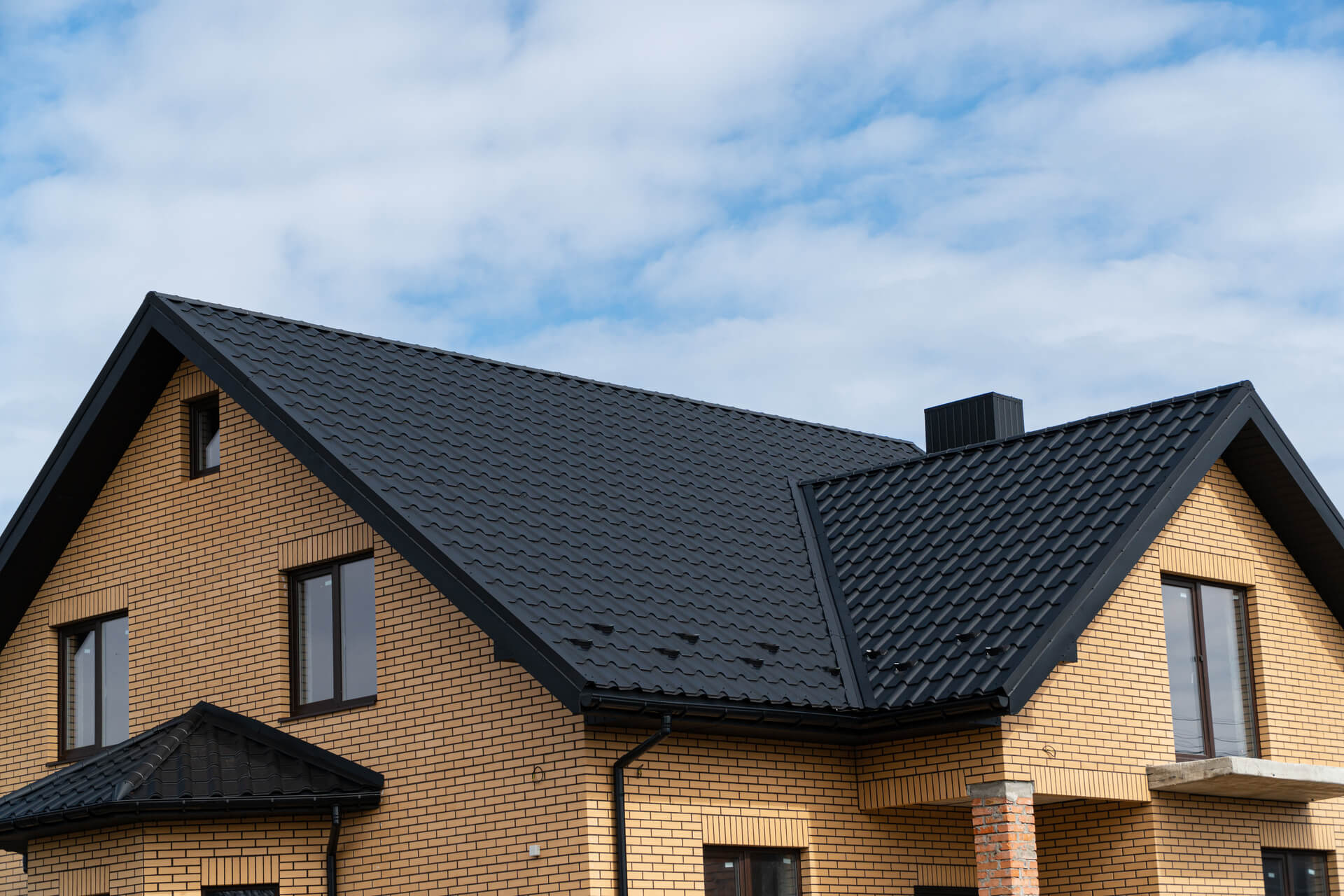 What should you consider when choosing paint for your roof?